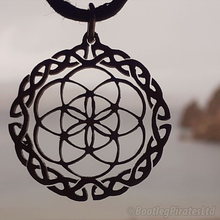 Load image into Gallery viewer, Seed of Life, with a Celtic Border, Hand Cut Coin.