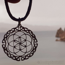 Load image into Gallery viewer, Seed of Life, with a Celtic Border, Hand Cut Coin.