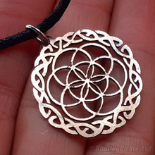 Load image into Gallery viewer, Seed of Life, with a Celtic Border, Hand Cut Coin.