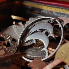 Load image into Gallery viewer, Icelandic Five Kroner, Hand Cut Coin Dolphin.