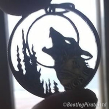 Load image into Gallery viewer, Howling Wolf at Moon, Hand Cut Coin Pendant.