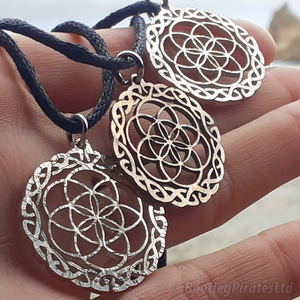 Seed of Life, with a Celtic Border, Hand Cut Coin.
