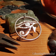 Load image into Gallery viewer, Eye of Horus, Hand Cut Coin.
