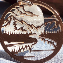 Load image into Gallery viewer, Panorama, Mountain Scene, Hand Cut Coin.
