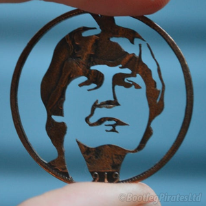 Beatles Hand Cut Coin Collection.
