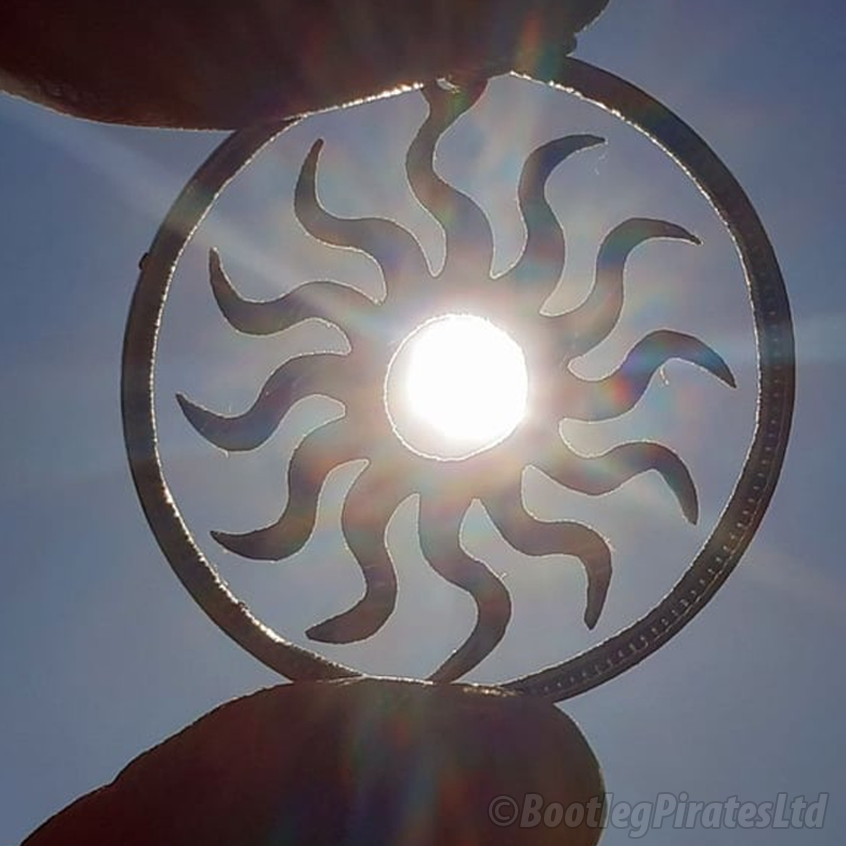 Sun, Hand Cut Coin.
